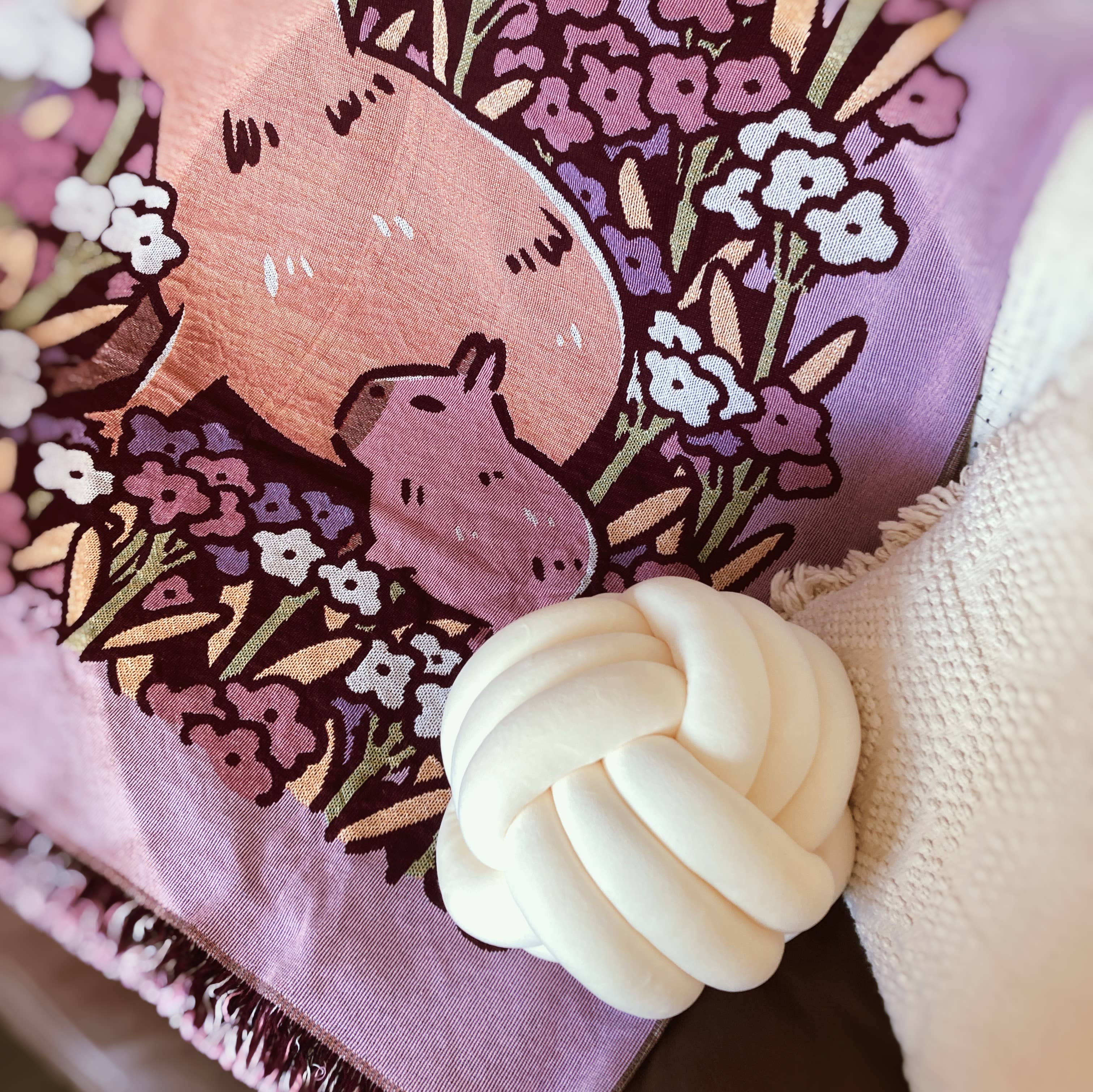 Pink Woven Blanket Featuring Chill Capybaras and Flowers